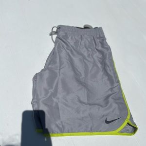 NWT Nike xxl swim shorts color gray with neon green trim, in perfect condition!